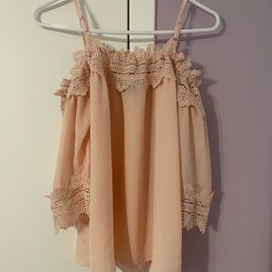 Pink blouse with lace detail